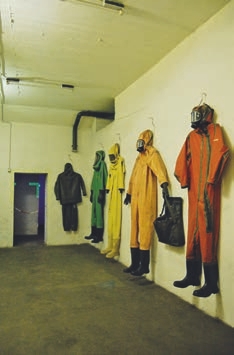  Clothing, Coat, Adult, Female, Person, Woman, Glove, Accessories, Bag, Handbag, Footwear, Shoe, Indoors, Helmet, Raincoat