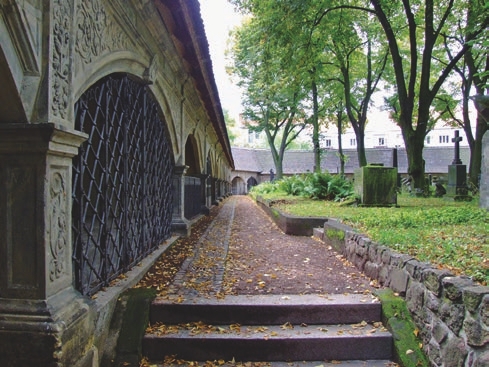  Outdoors, Architecture, Building, Monastery, City, Road, Street, Urban, Path, Housing, Graveyard, Arch, Gothic Arch, Person, Tomb, House, Gravestone